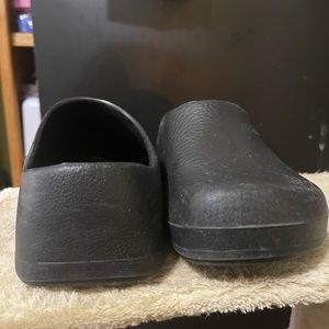 Black rubber Birkenstock clogs
